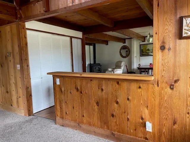 a kitchen with a sink cabinets and stainless steel appliances
