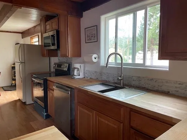 a bathroom with a shower and toilet