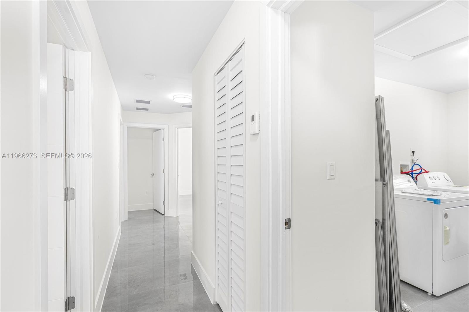 933 Northwest 50th Street Miami, FL 33127 - Photo 11 of 31 a view of a hallway with closet