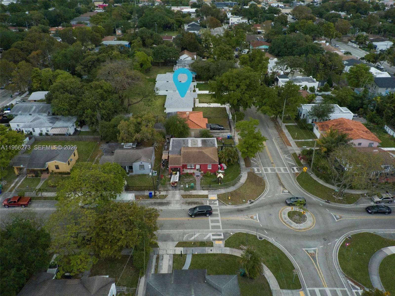933 Northwest 50th Street Miami, FL 33127 - Photo 29 of 31 an aerial view of a house with outdoor space