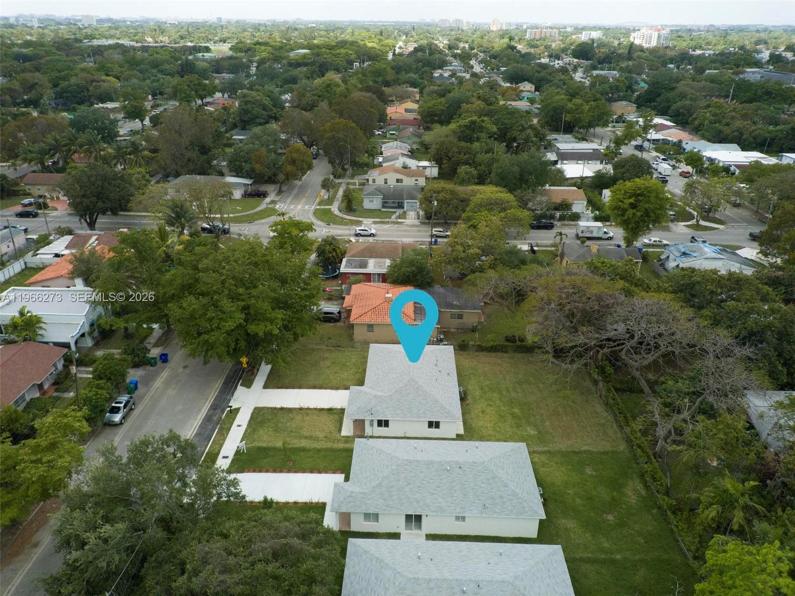 933 Northwest 50th Street Miami, FL 33127 - Photo 30 of 31 an aerial view of a house with a yard