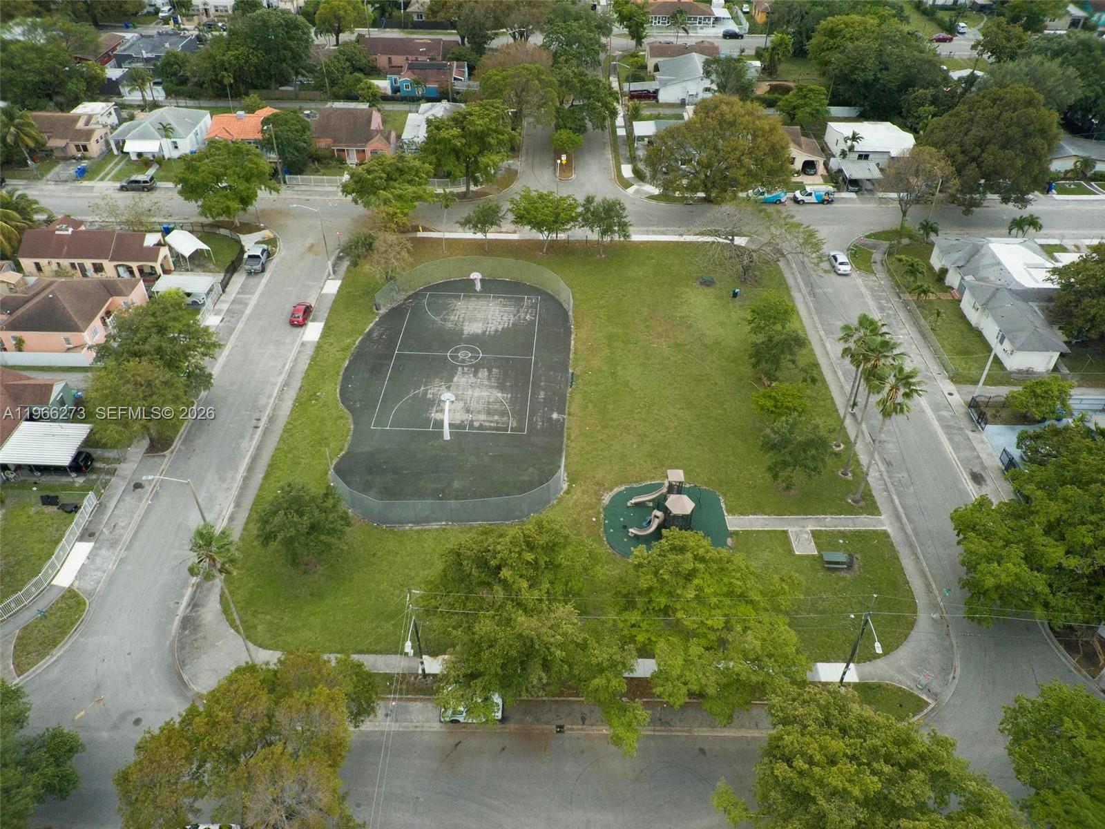 933 Northwest 50th Street Miami, FL 33127 - Photo 31 of 31 an aerial view of a house with outdoor space and swimming pool