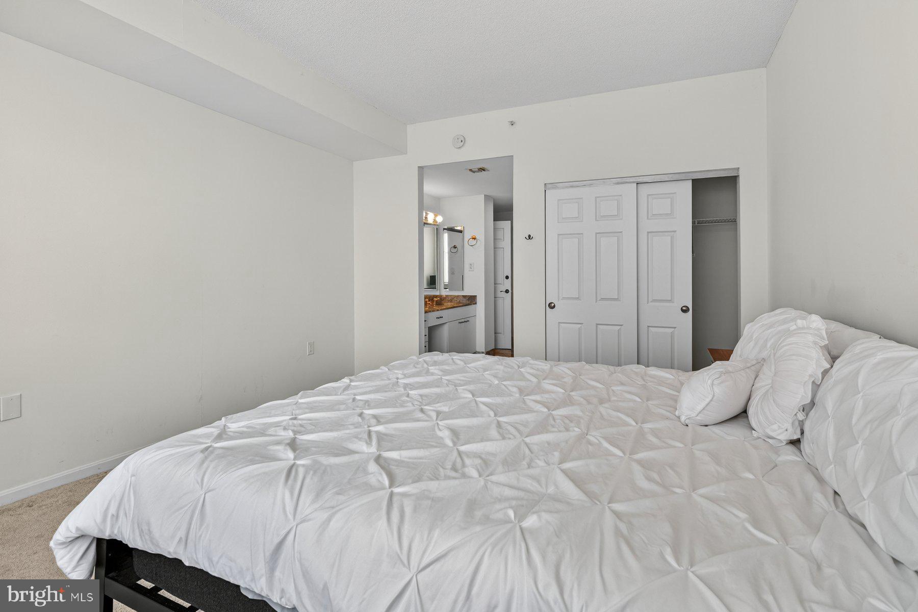 3801 Canterbury Road, Unit 403 Baltimore, MD 21218 - Photo 18 of 25 Bright and airy bedroom retreat.