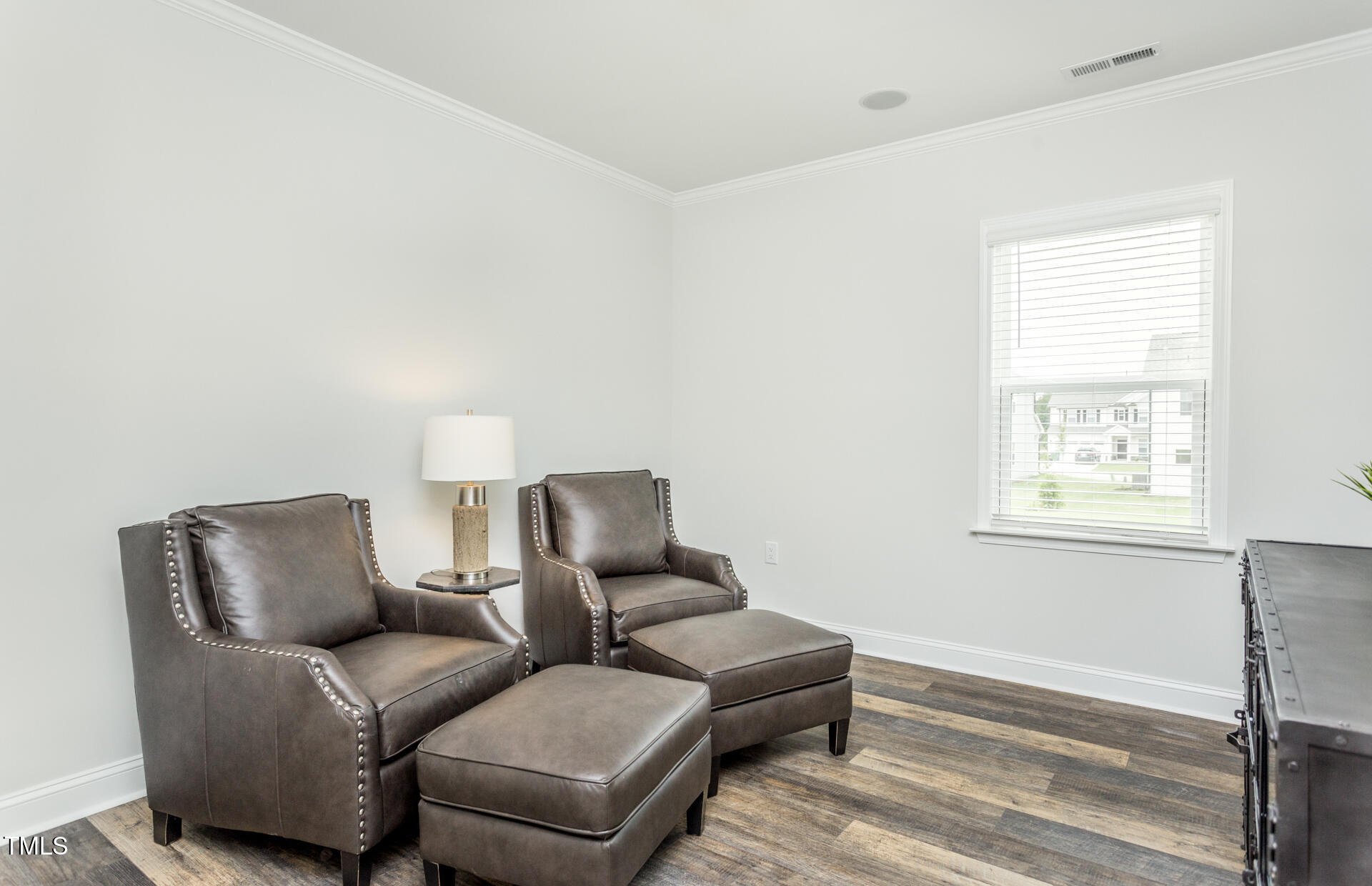 1111 Freestone Road Durham, NC 27703 - Photo 14 of 16 a living room with furniture and a window