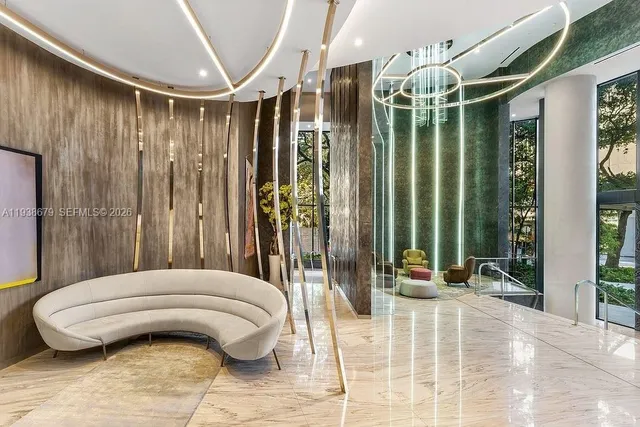 a view of a living room and bathroom