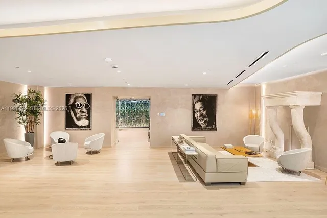 a view of a patio with couches table and chairs and potted plants