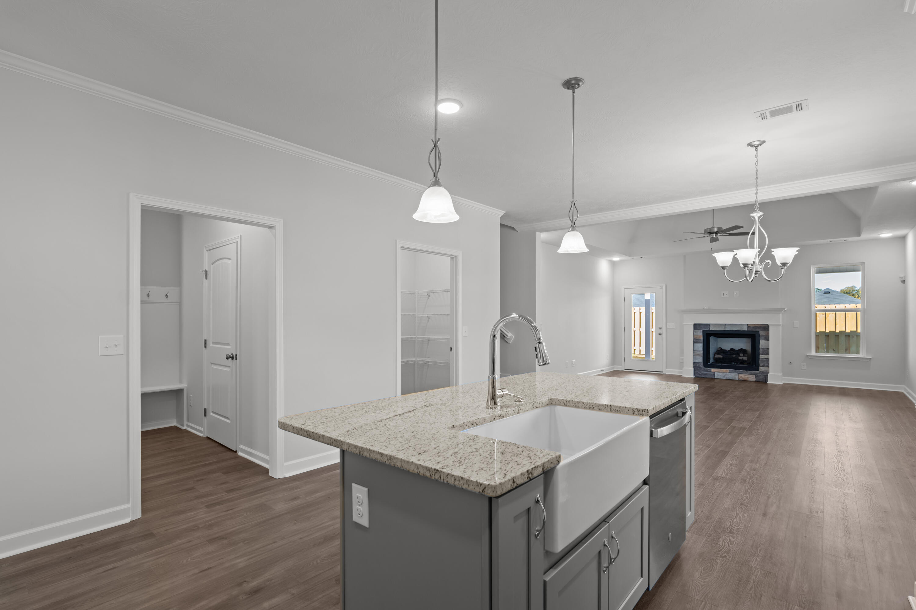 8163 Snelling Drive Aiken, SC 29803 - Photo 11 of 50 Nice size island with pendant lights and ceramic farmhouse sink.,