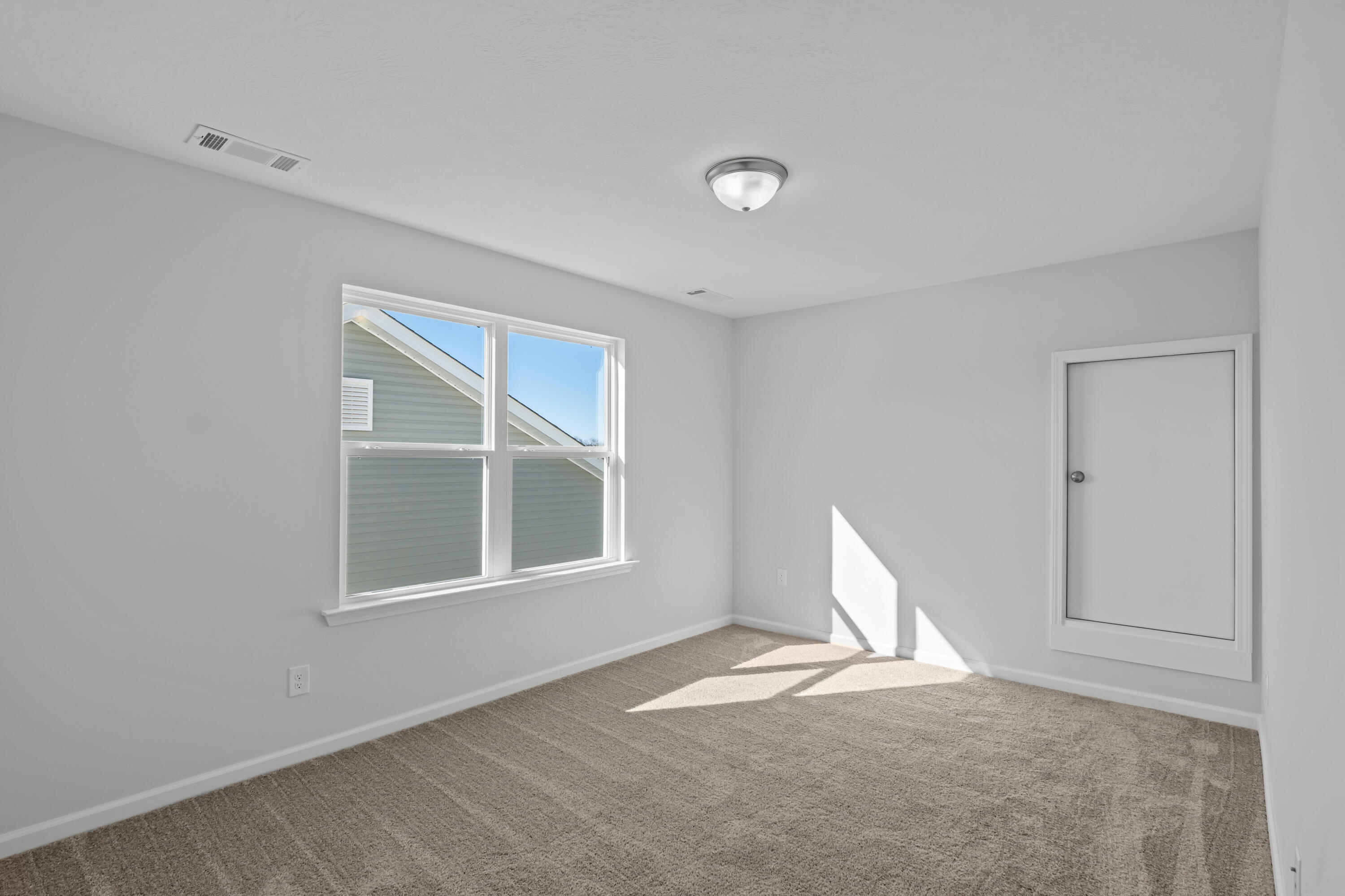 8163 Snelling Drive Aiken, SC 29803 - Photo 29 of 50 2nd. bedroom that is upstairs with attic access and lots of natural lighting.