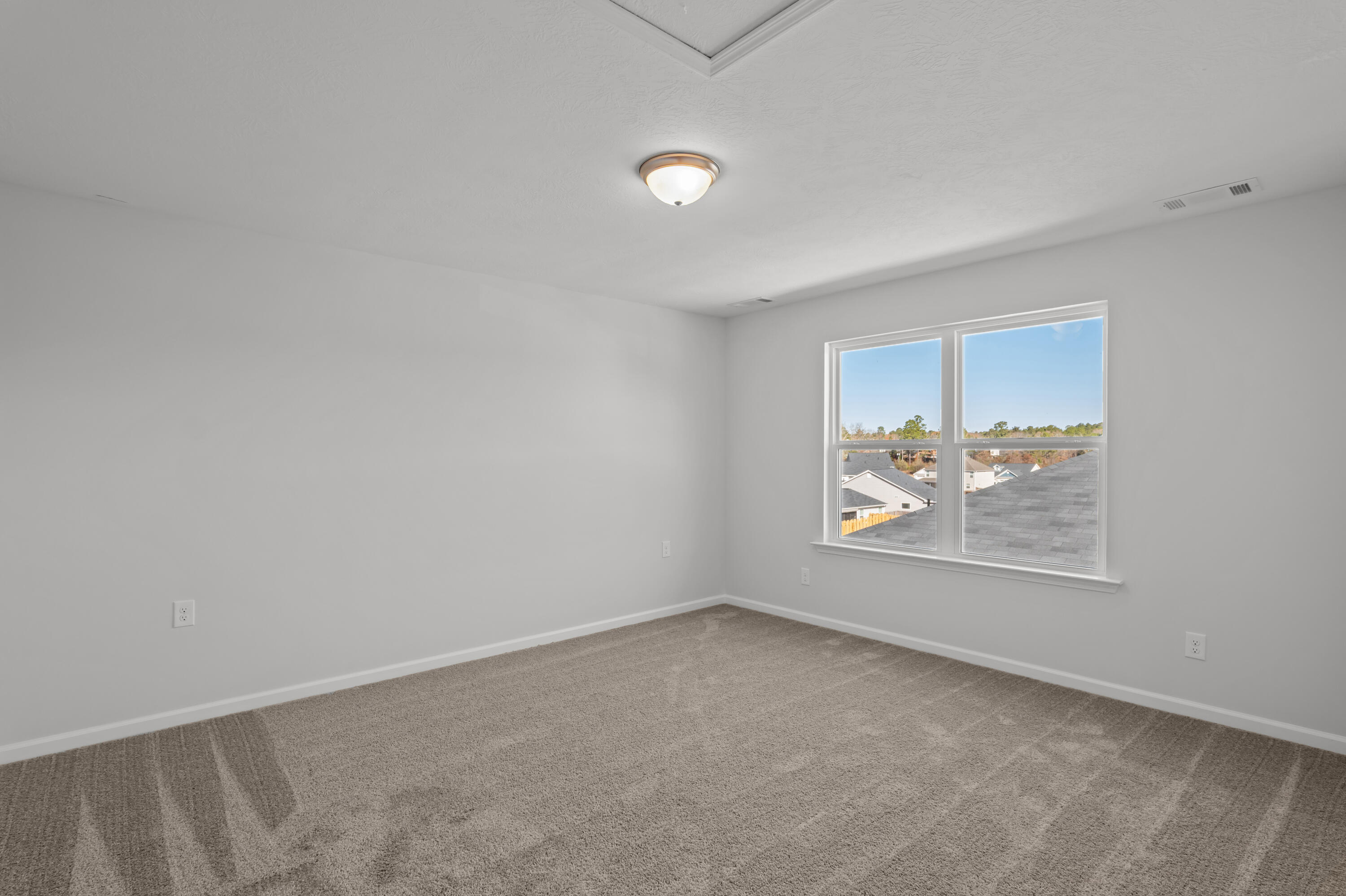 8163 Snelling Drive Aiken, SC 29803 - Photo 32 of 50 Good size 3rd. bedroom upstairs with lots of natural lighting.