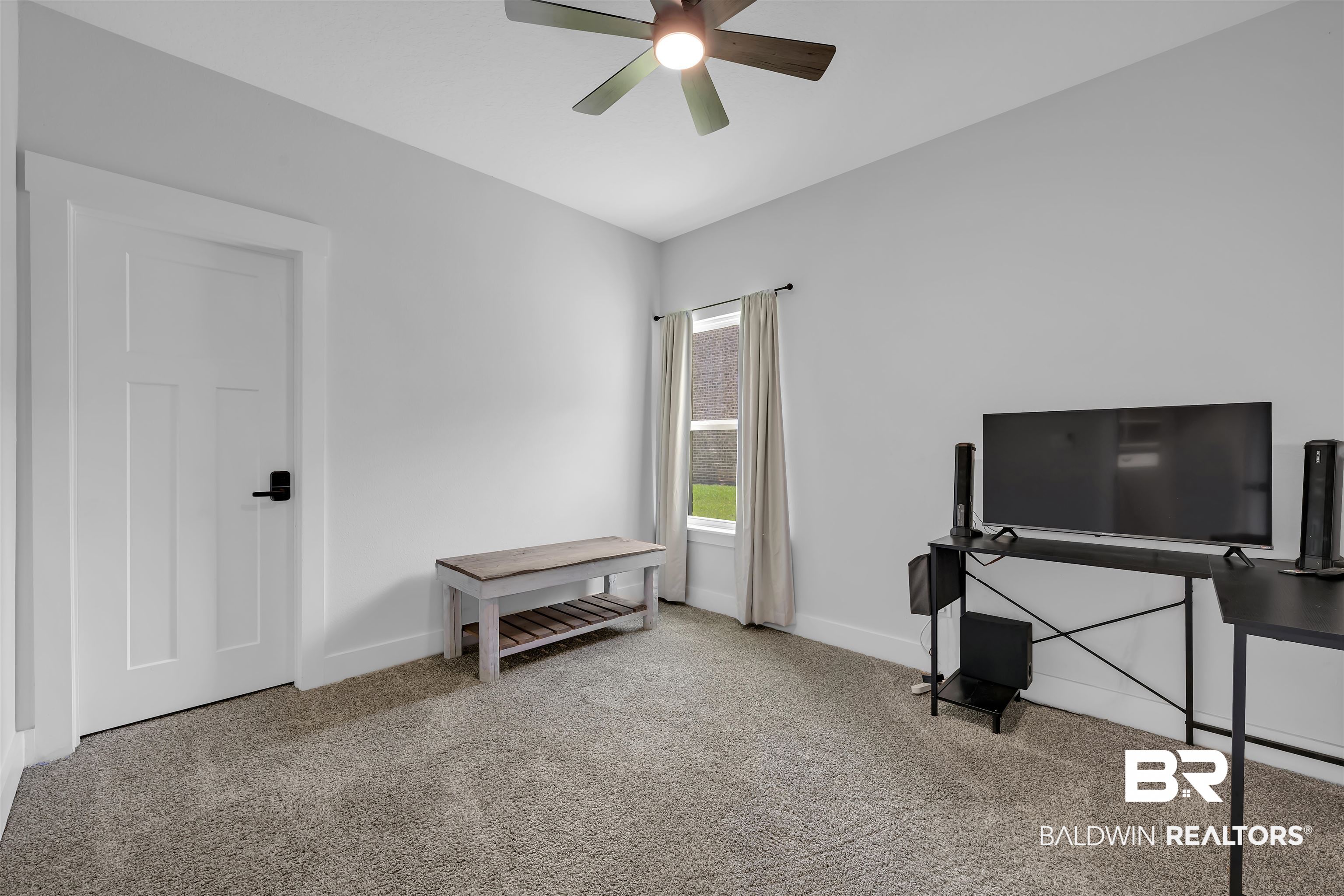 16504 Prado Loop Loxley, AL 36551 - Photo 31 of 45 Recreation room featuring light carpet and ceiling fan