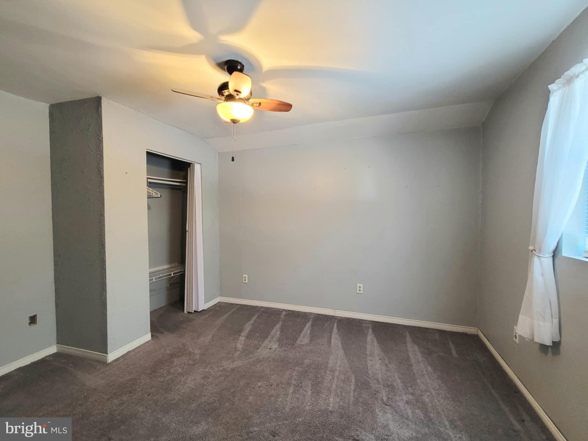 142 Hillcrest Street Winburne, PA 16879 - Photo 21 of 26 a view of an empty room with a window
