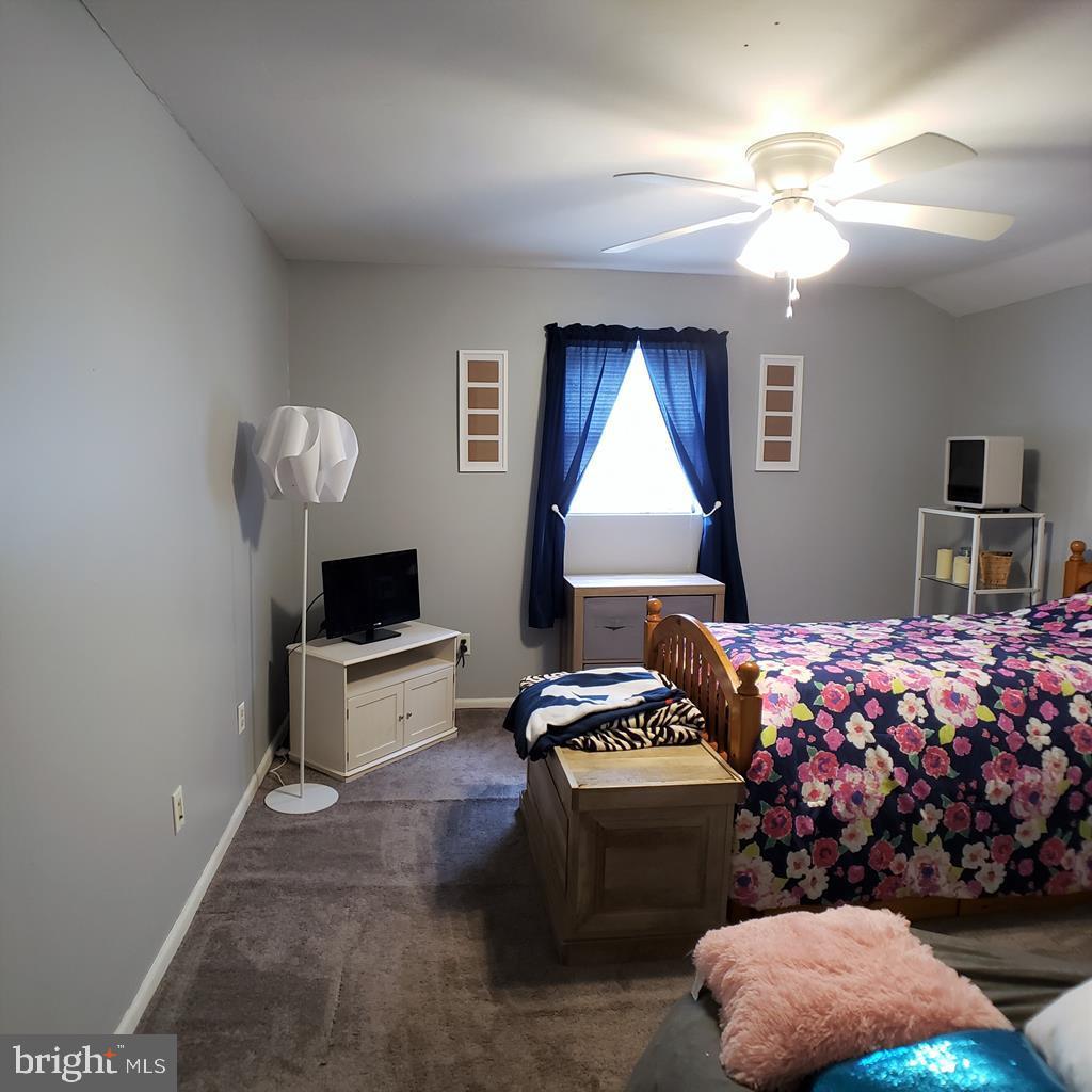 142 Hillcrest Street Winburne, PA 16879 - Photo 23 of 26 a bedroom with bed and a window