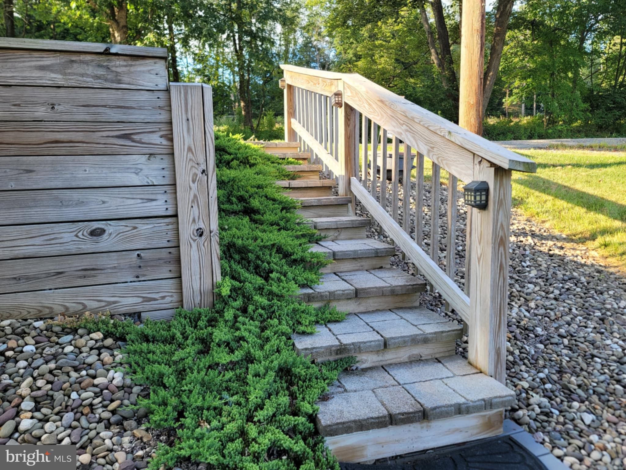 142 Hillcrest Street Winburne, PA 16879 - Photo 4 of 26 a view of a garden with wooden stairs