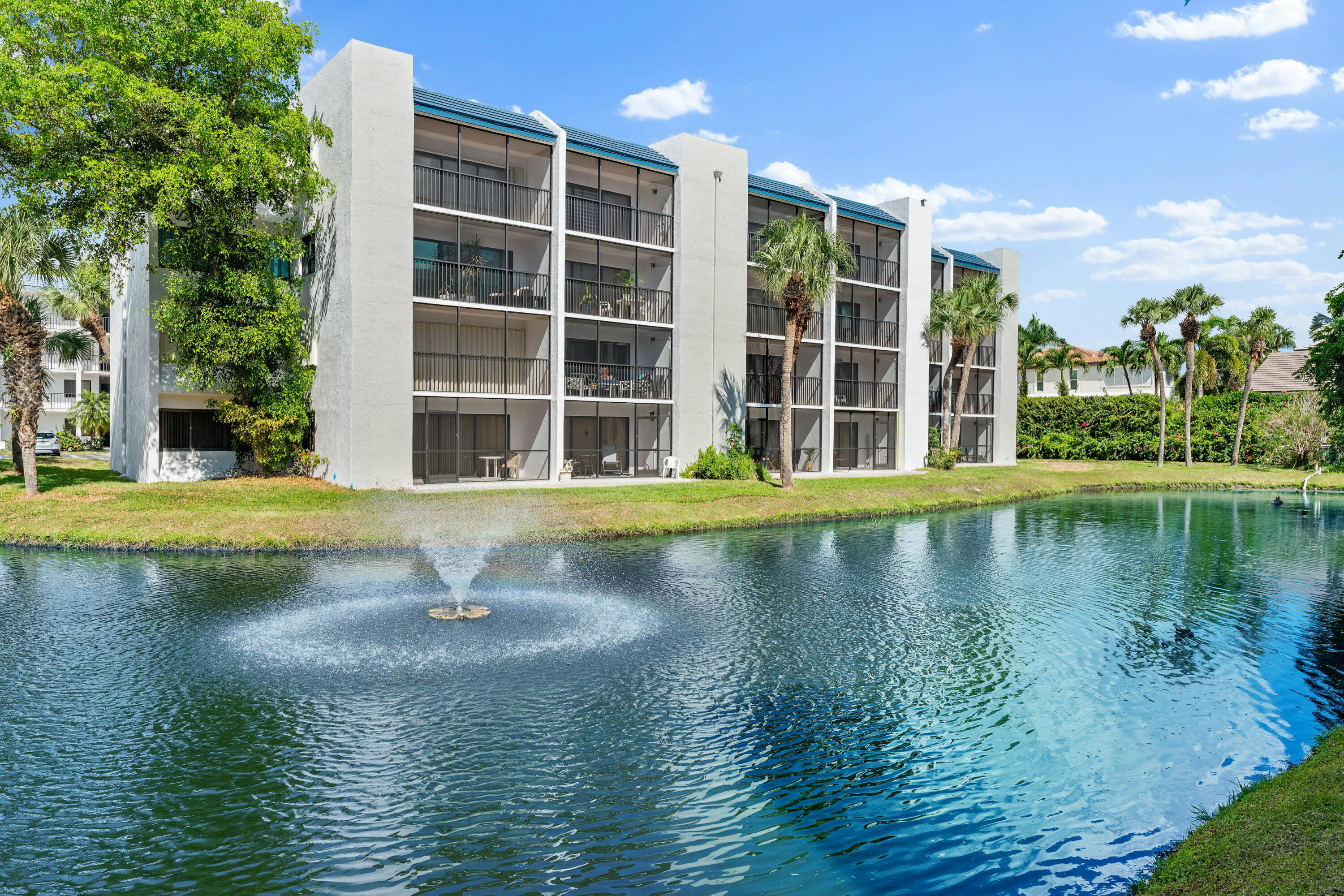 1605 Highway 1, Unit D101 Jupiter, FL 33477 - Photo 1 of 29 a view of pool with lake view