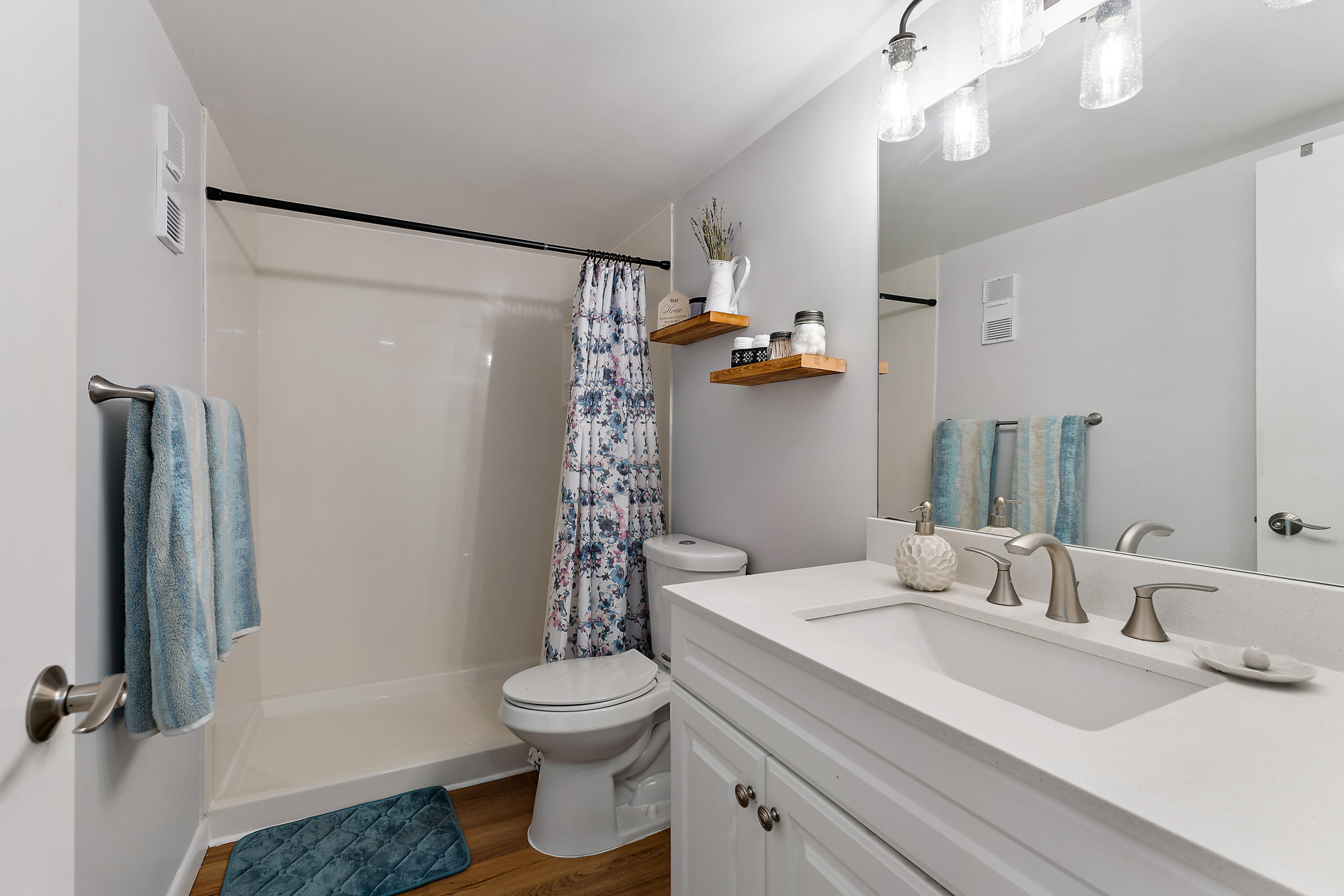 1605 Highway 1, Unit D101 Jupiter, FL 33477 - Photo 19 of 29 a bathroom with a sink toilet and shower