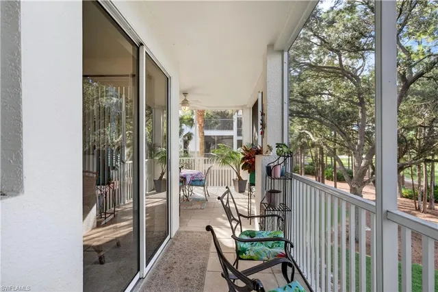 a view of a balcony with chairs