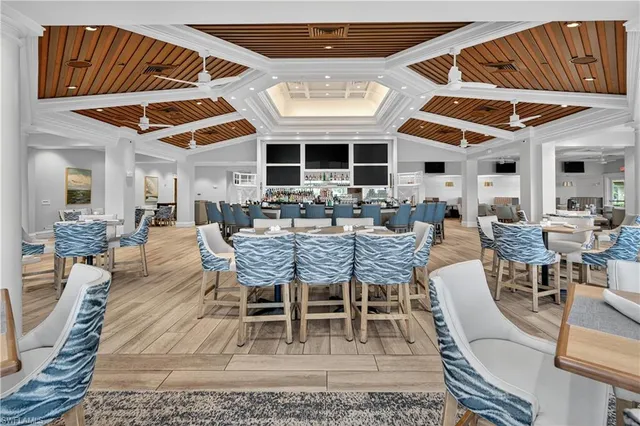 a dining room with furniture and outdoor space