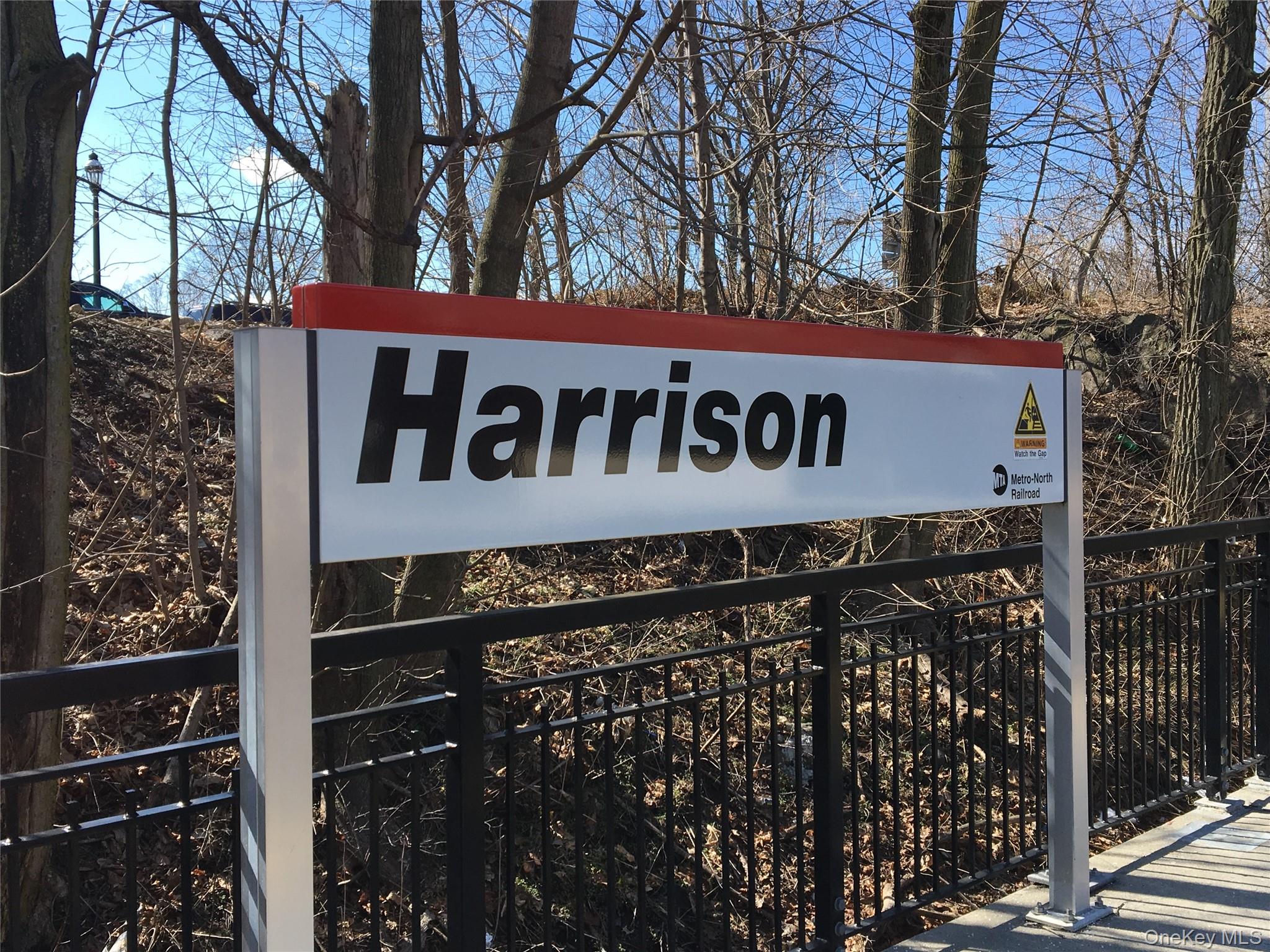 135 Webster Avenue, Unit 2 Harrison, NY 10528 - Photo 24 of 25 a street sign that is on a pole