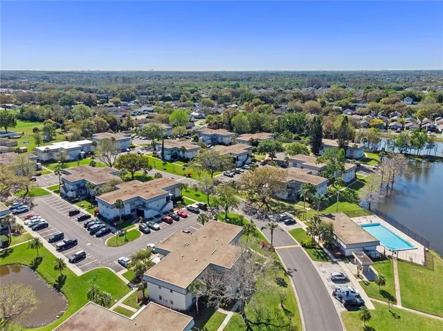 an aerial view of a city with lots of residential buildings