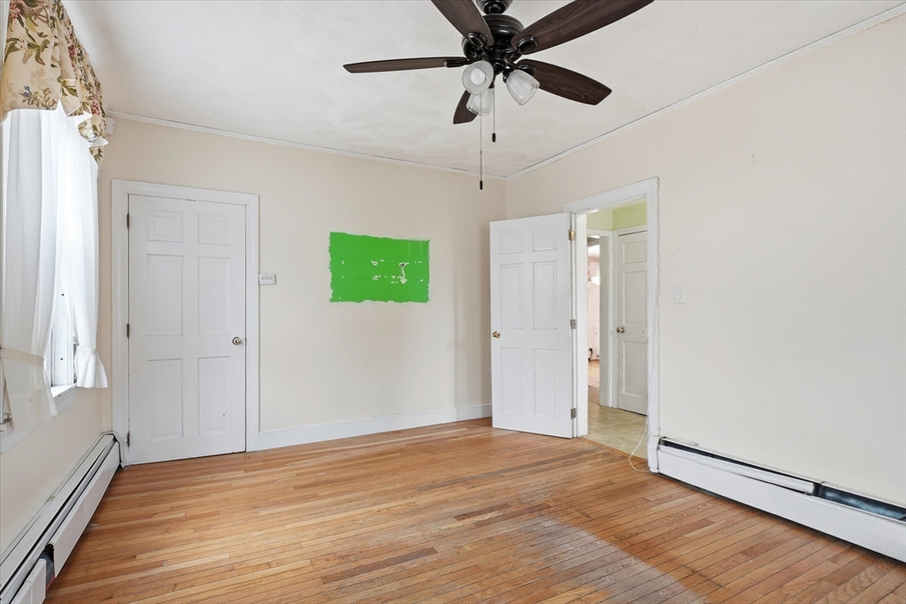 53 Kendall Street Lawrence, MA 01841 - Photo 15 of 36 wooden floor in an empty room