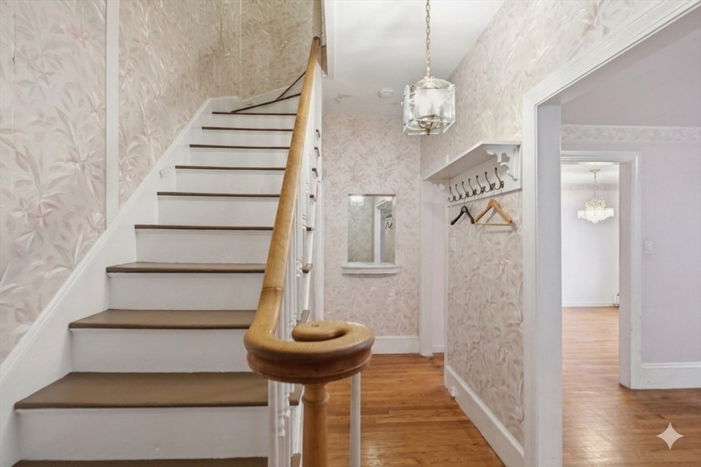 53 Kendall Street Lawrence, MA 01841 - Photo 18 of 36 a view of entryway and hall with wooden floor
