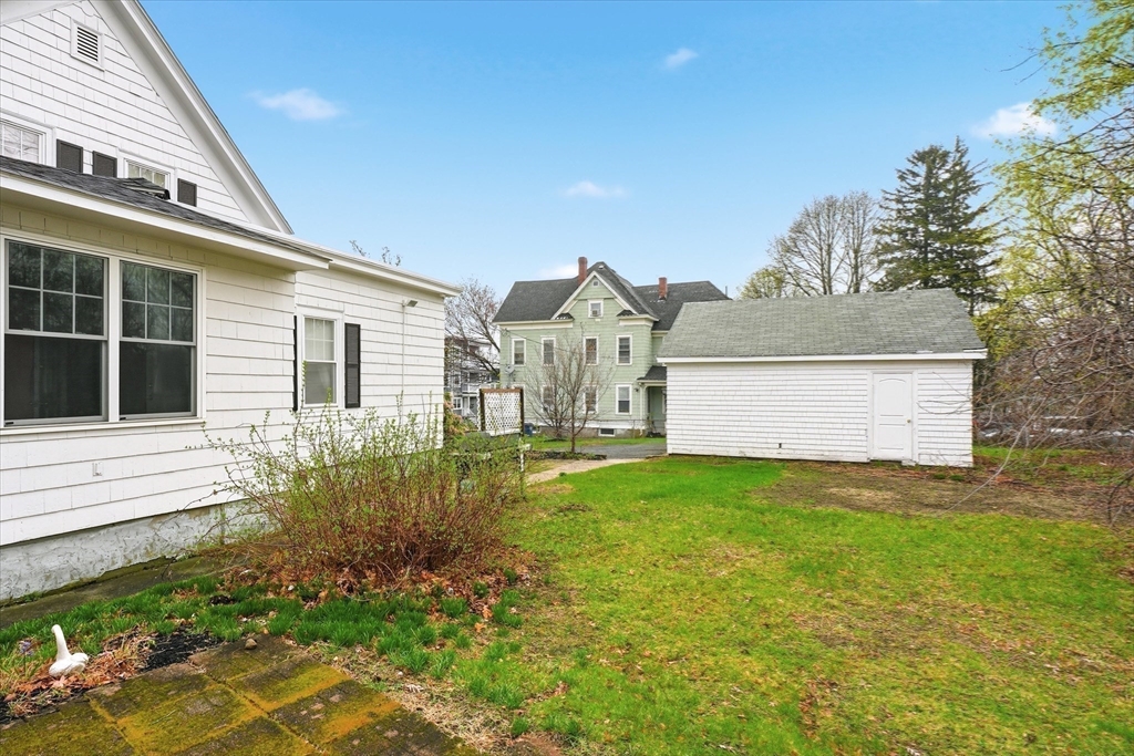 53 Kendall Street Lawrence, MA 01841 - Photo 33 of 36 a view of a house with a garden
