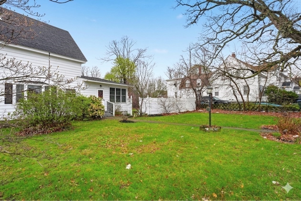 53 Kendall Street Lawrence, MA 01841 - Photo 34 of 36 a view of a house with a backyard