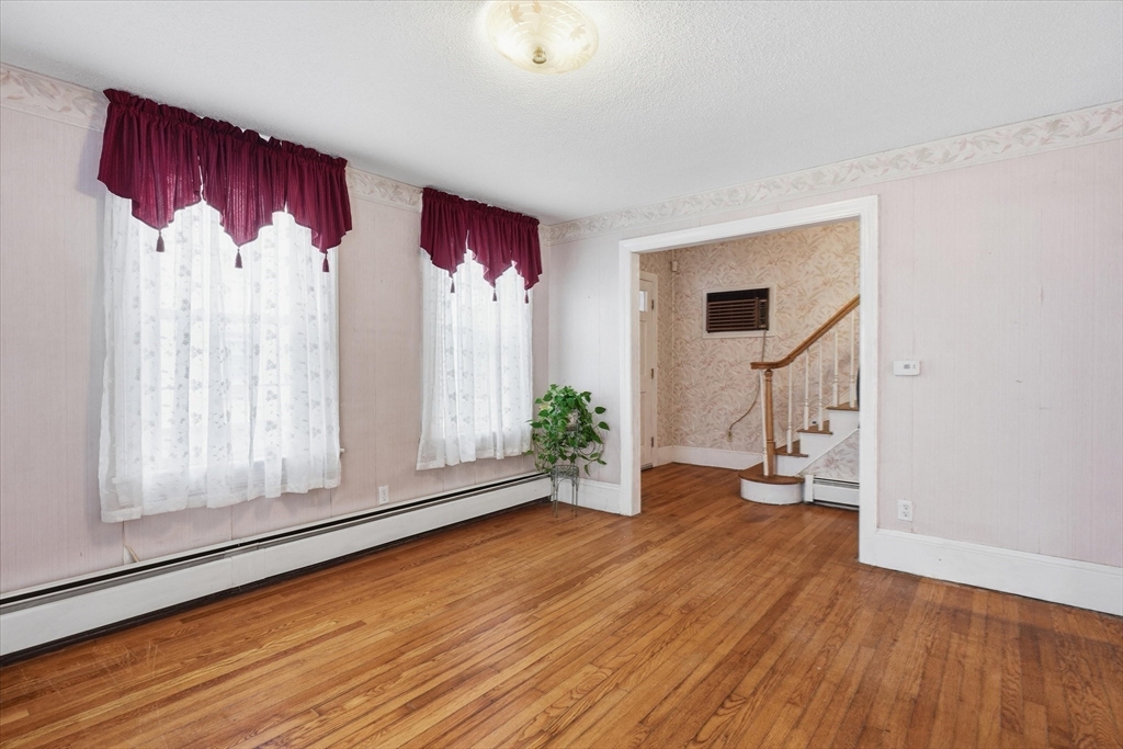 53 Kendall Street Lawrence, MA 01841 - Photo 9 of 36 a view of entryway with wooden floor
