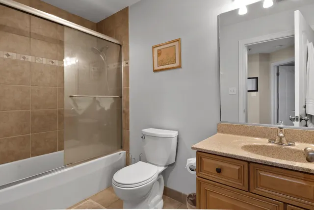 a bathroom with a sink a toilet and a bathtub