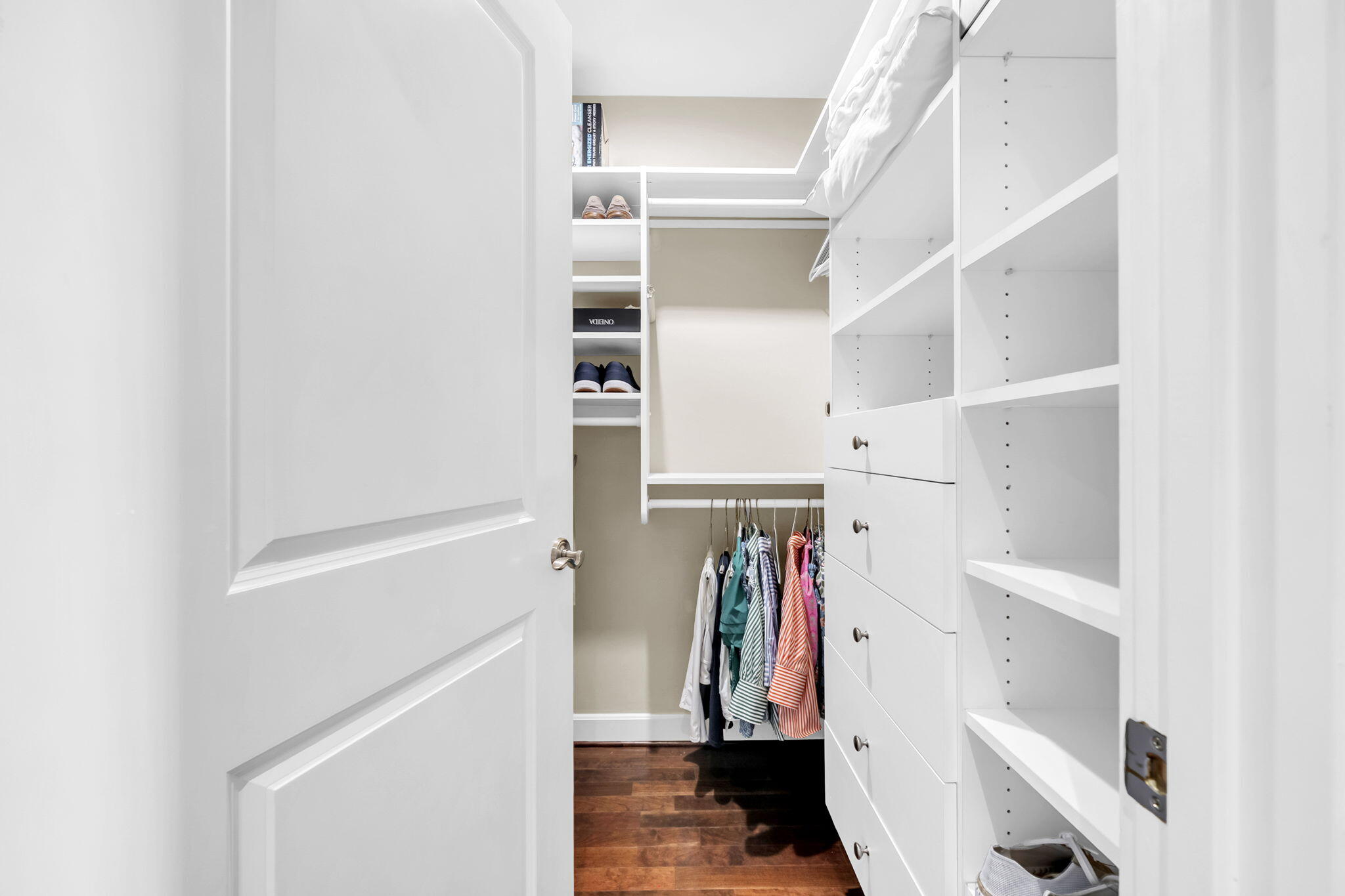 5360 Pine Ridge Lane, Unit 5360 Miramar Beach, FL 32550 - Photo 22 of 44 a view of walk in closet with clothes and shoes