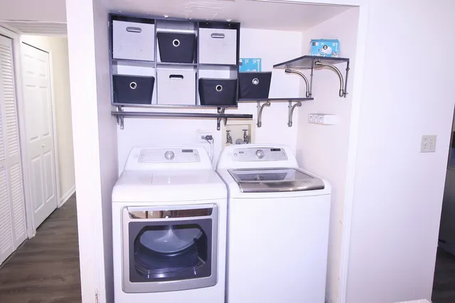 a utility room with dryer and washer