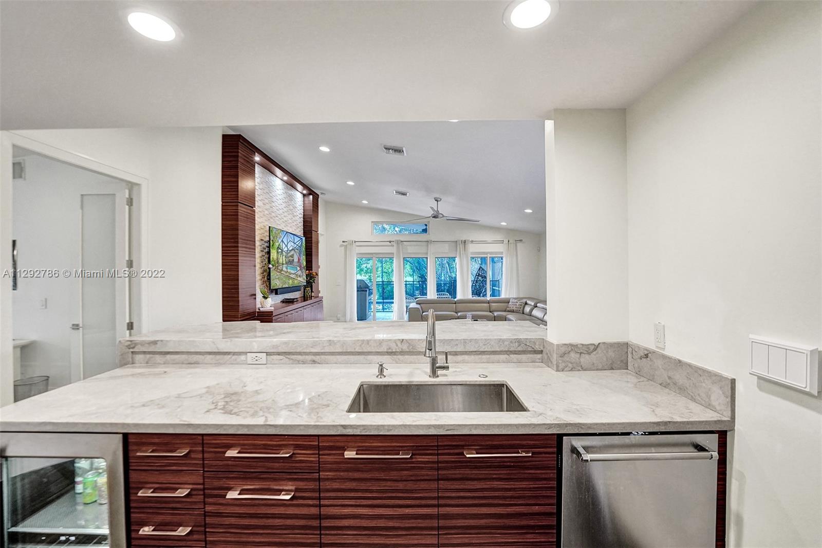 10150 Camelback Lane Boca Raton, FL 33498 - Photo 19 of 67 a bathroom with a granite countertop sink and a mirror