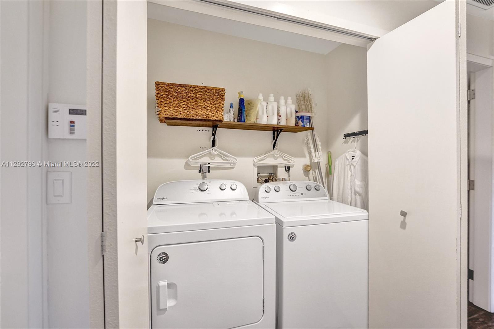 10150 Camelback Lane Boca Raton, FL 33498 - Photo 41 of 67 a utility room with dryer and washer