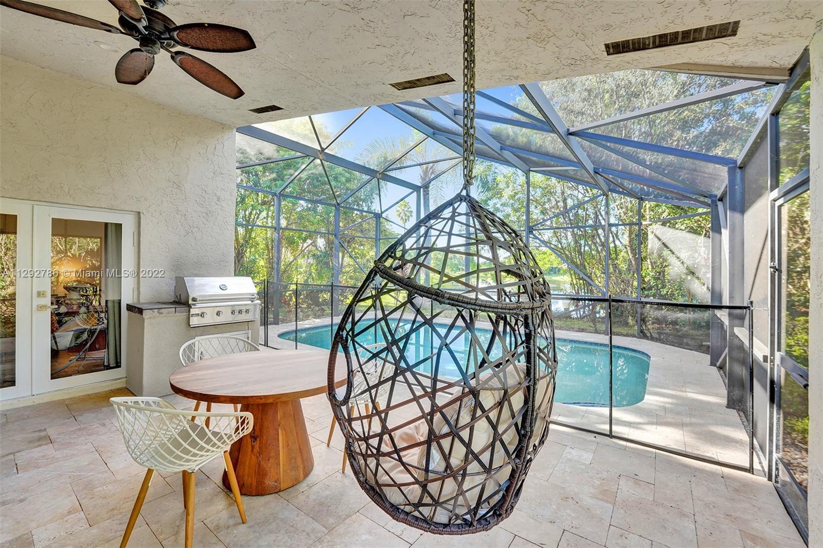 10150 Camelback Lane Boca Raton, FL 33498 - Photo 42 of 67 a view of a dining room with furniture window and outside view