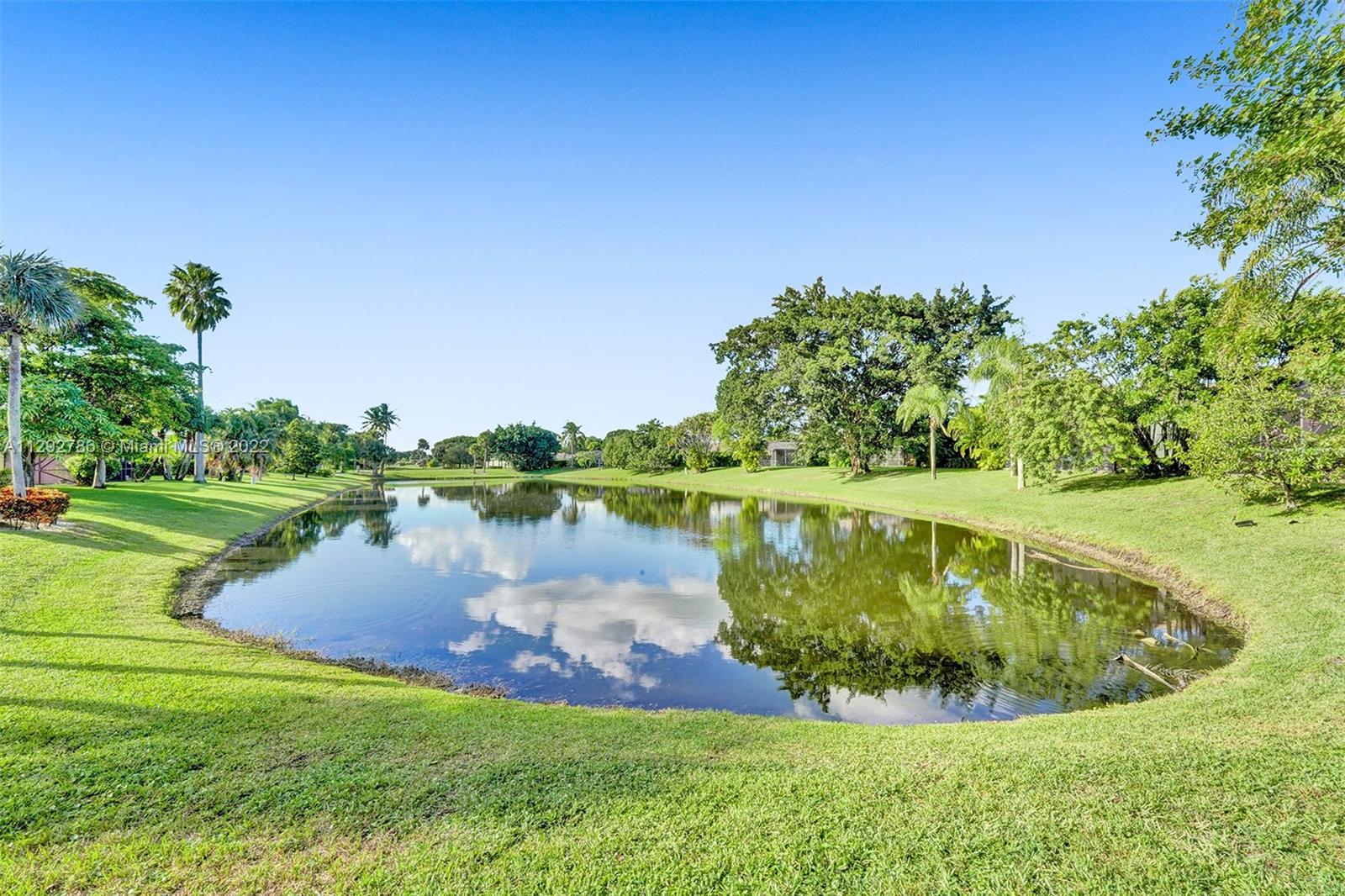 10150 Camelback Lane Boca Raton, FL 33498 - Photo 50 of 67 a view of a lake from a yard