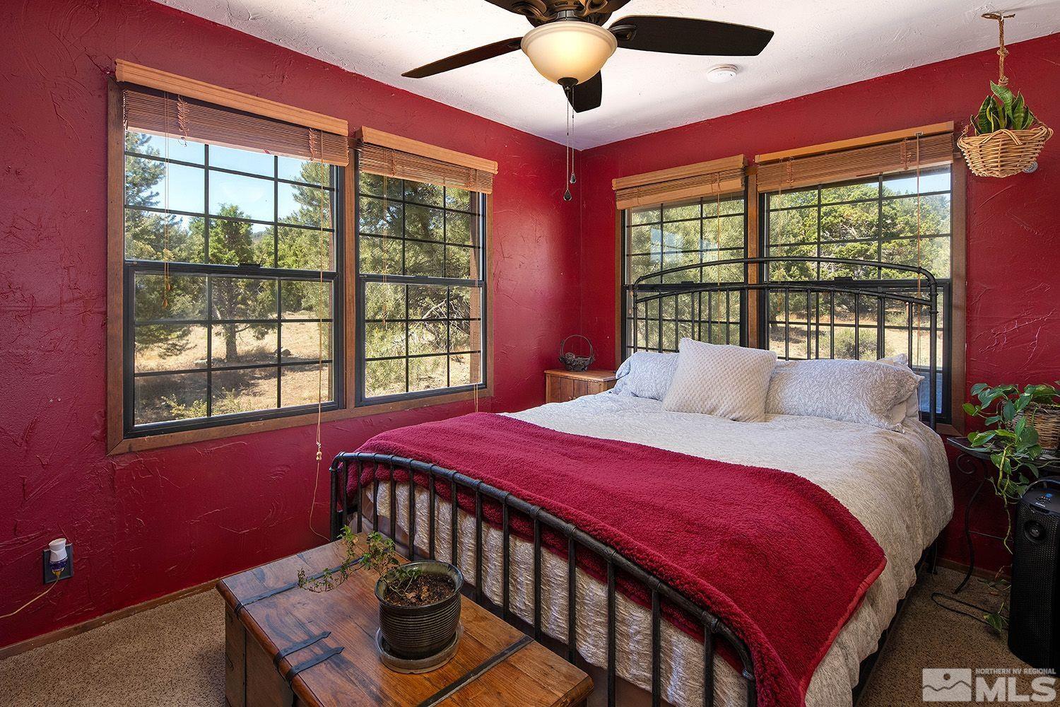2090 Lousetown Road Reno, NV 89521 - Photo 17 of 30 a bedroom with a bed and a window