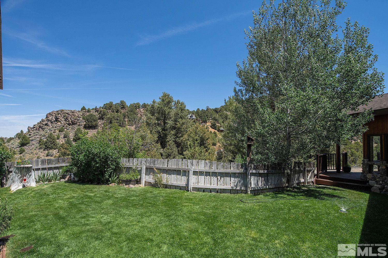 2090 Lousetown Road Reno, NV 89521 - Photo 27 of 30 a view of a deck with a big yard