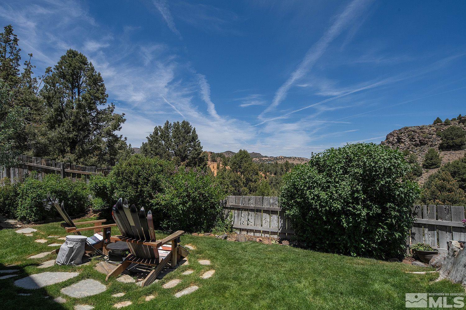 2090 Lousetown Road Reno, NV 89521 - Photo 28 of 30 a view of backyard with plants and outdoor seating