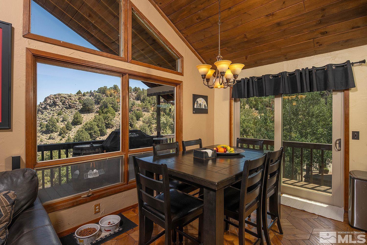 2090 Lousetown Road Reno, NV 89521 - Photo 10 of 30 a view of a dining room with furniture window and outside view