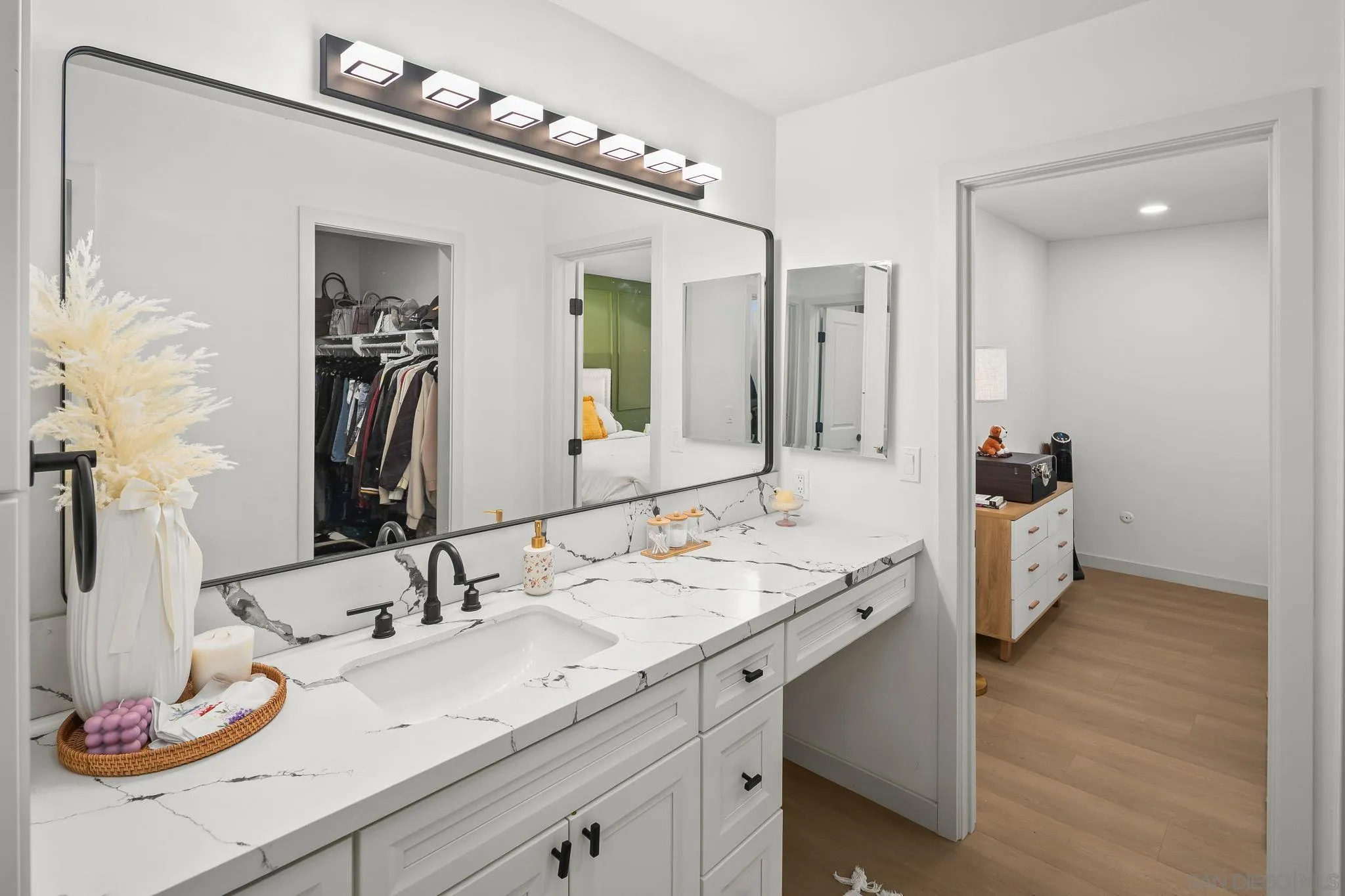 6780 Friars Road, Unit 272 San Diego, CA 92108 - Photo 12 of 35 a bathroom with a sink double vanity and a mirror