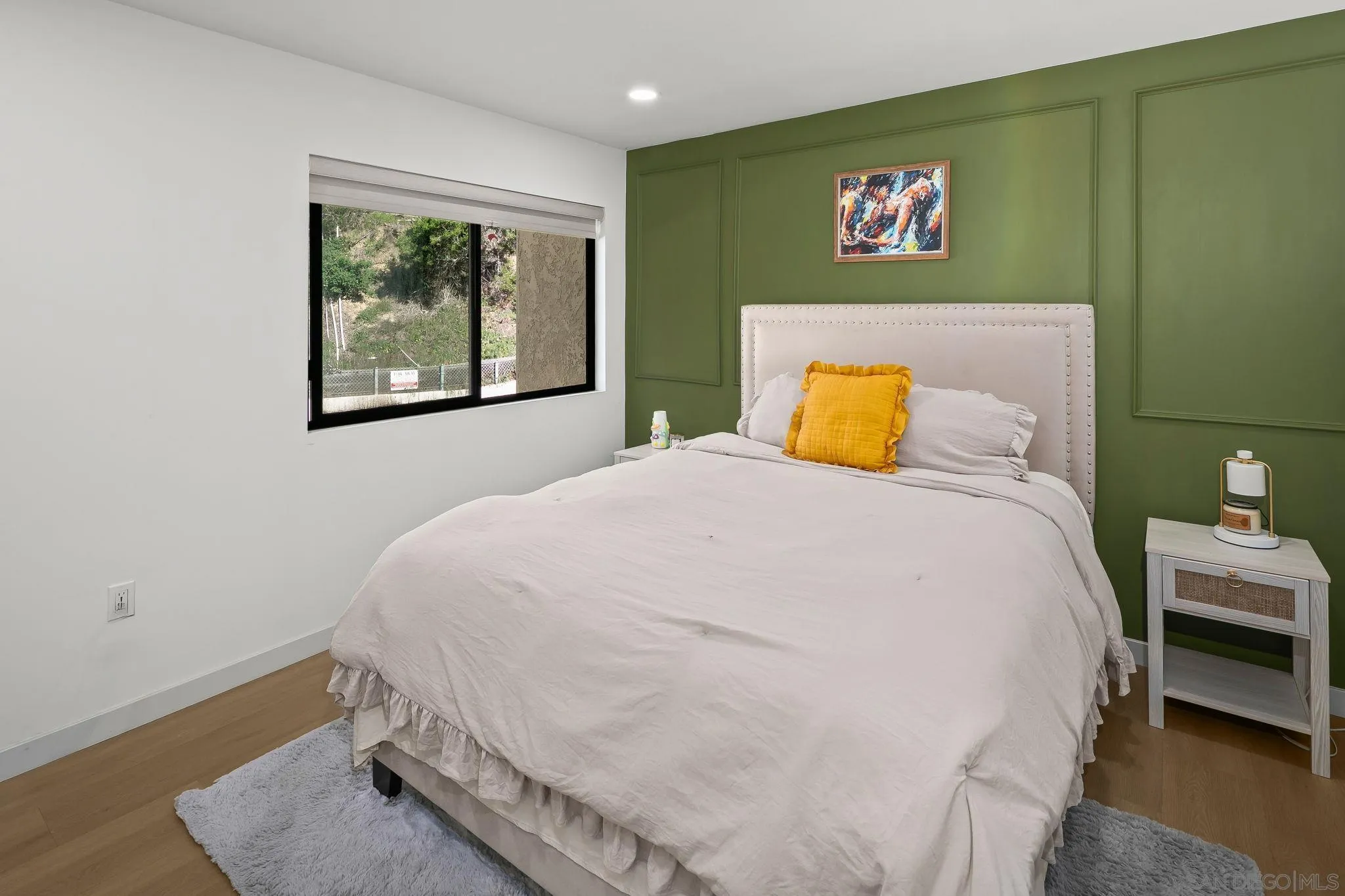 6780 Friars Road, Unit 272 San Diego, CA 92108 - Photo 13 of 35 a bed sitting in a bedroom next to a window