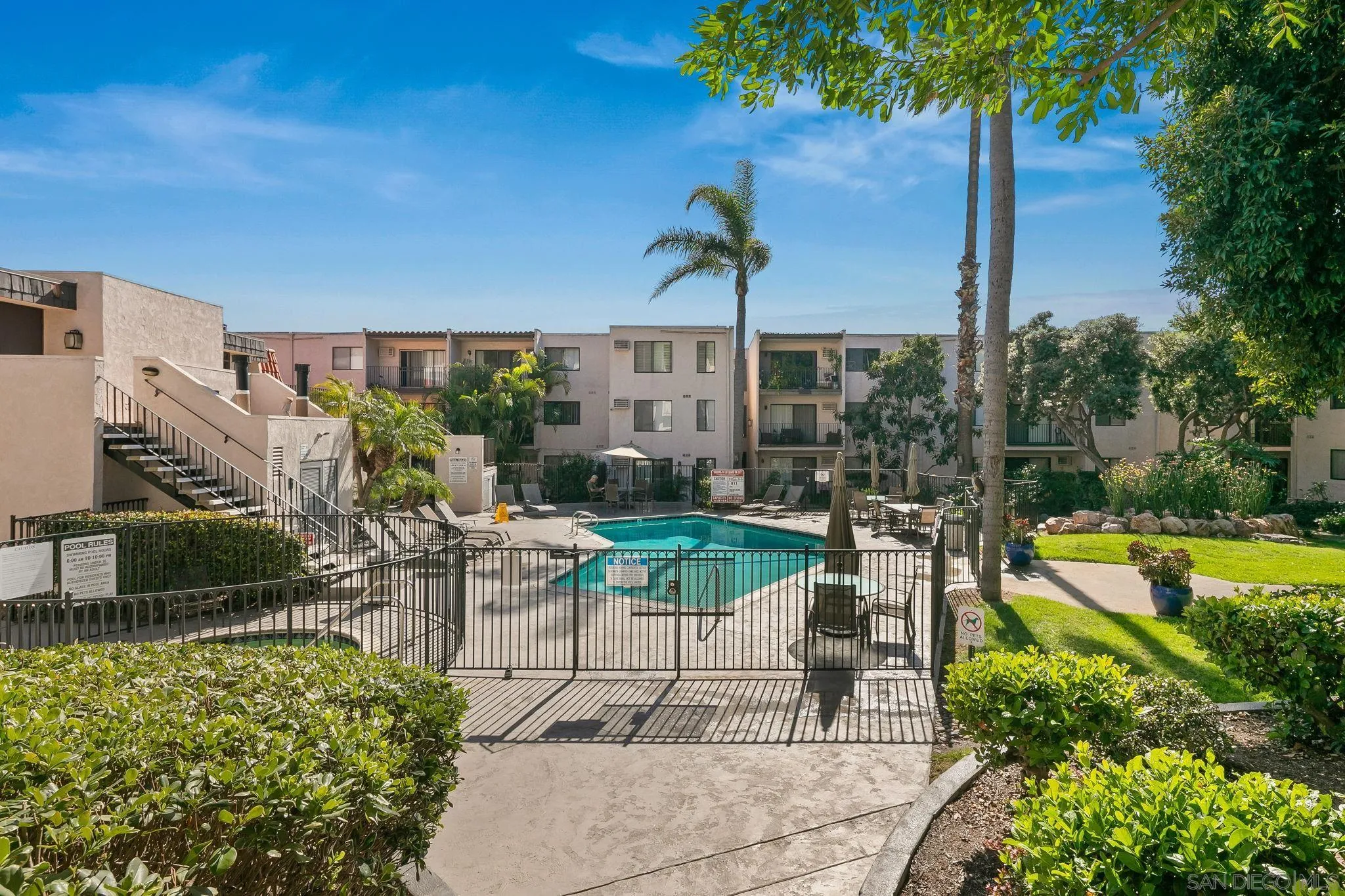6780 Friars Road, Unit 272 San Diego, CA 92108 - Photo 17 of 35 a view of a chair and tables in the patio