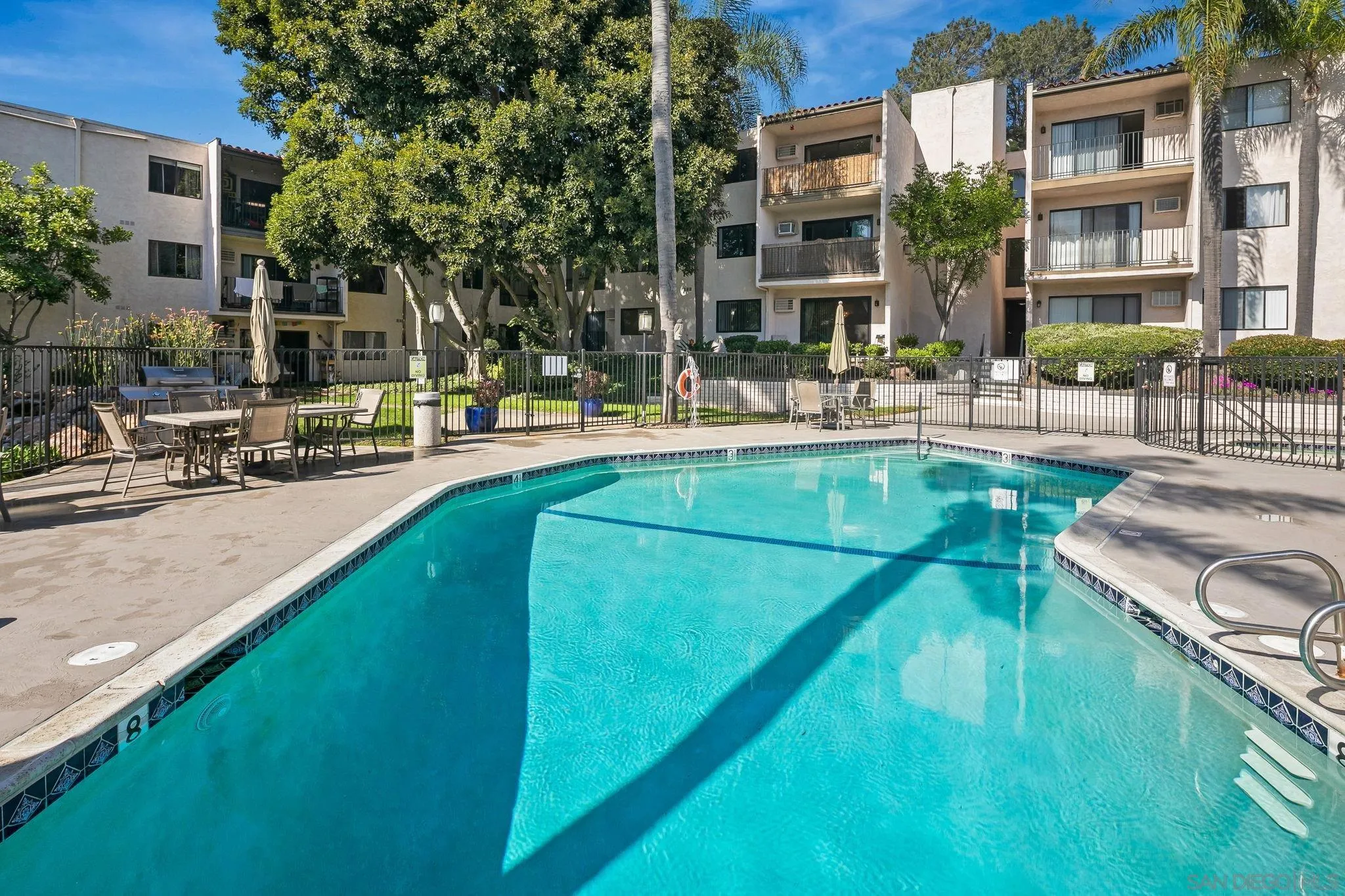 6780 Friars Road, Unit 272 San Diego, CA 92108 - Photo 22 of 35 a view of a house with swimming pool and sitting area