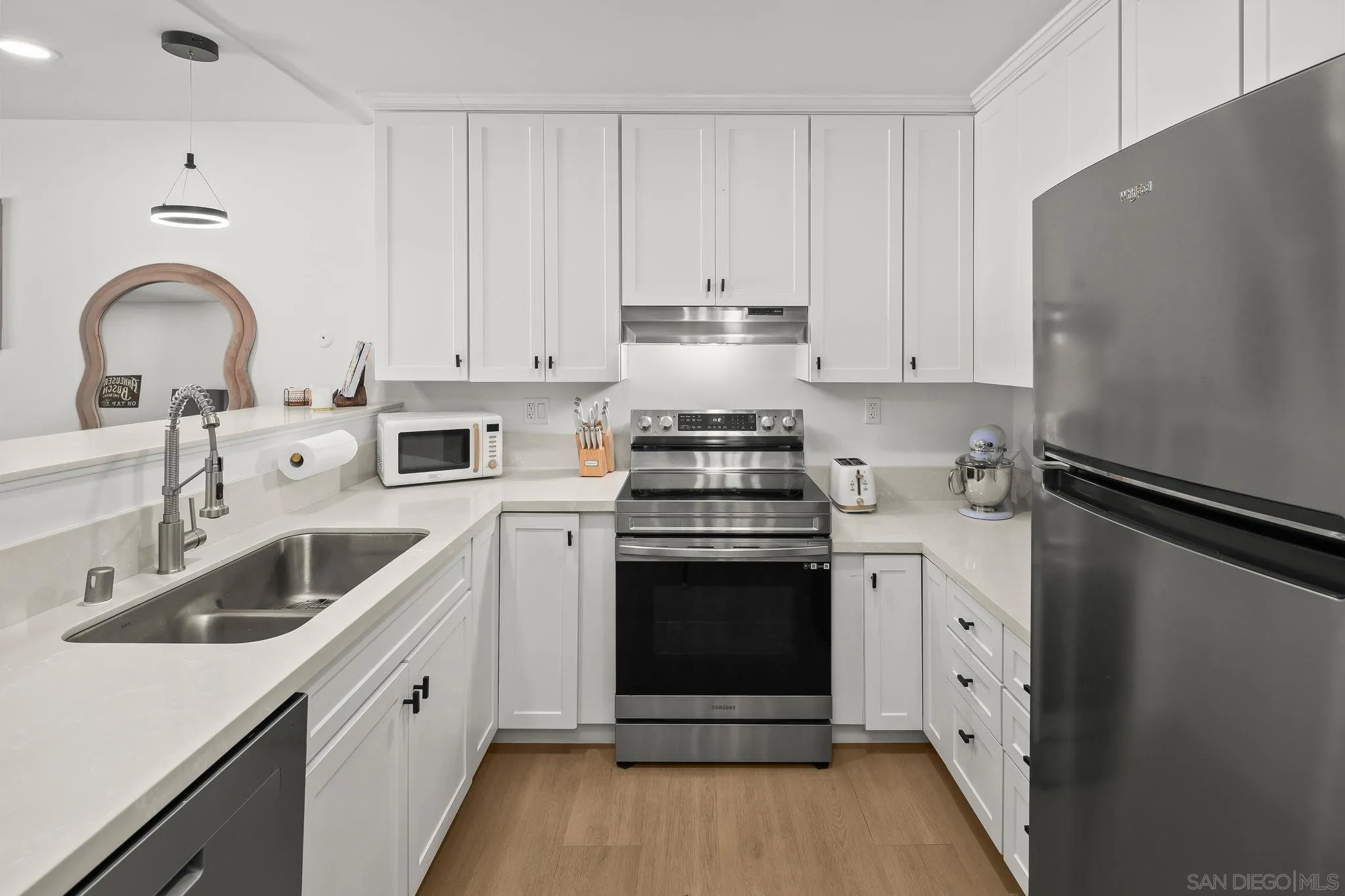 6780 Friars Road, Unit 272 San Diego, CA 92108 - Photo 3 of 35 a kitchen with a sink stove and refrigerator