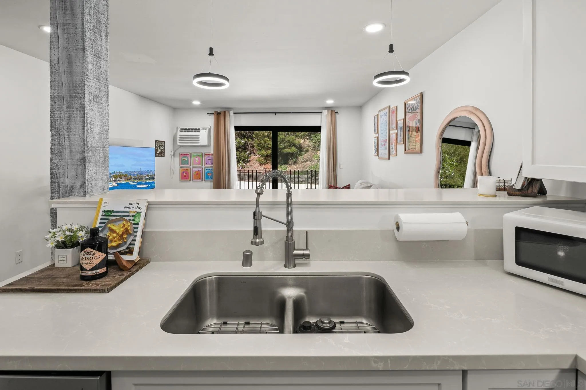 6780 Friars Road, Unit 272 San Diego, CA 92108 - Photo 5 of 35 a kitchen with sink a stove and cabinets