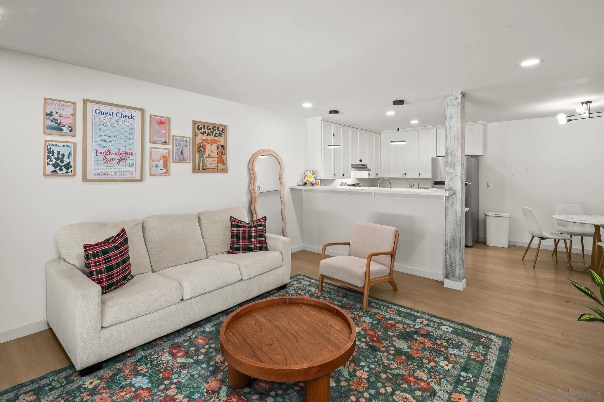 6780 Friars Road, Unit 272 San Diego, CA 92108 - Photo 6 of 35 a living room with furniture and a rug