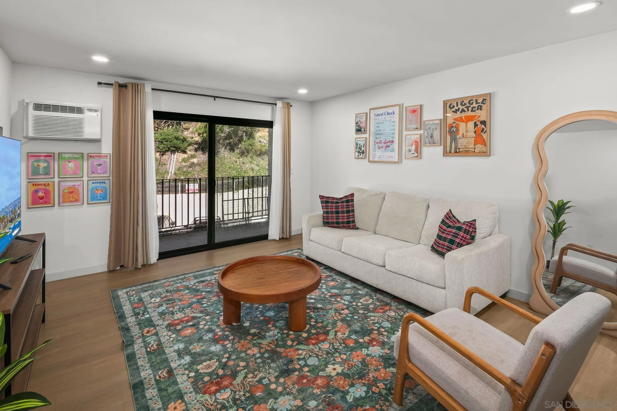 6780 Friars Road, Unit 272 San Diego, CA 92108 - Photo 9 of 35 a living room with furniture and a window