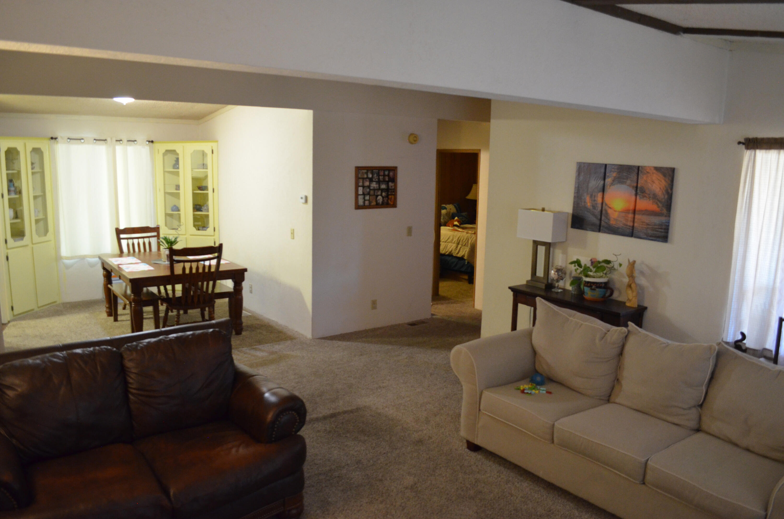 3835 Gardiner Ferry Road, Unit 17 Corning, CA 96021 - Photo 11 of 39 a living room with furniture and a flat screen tv