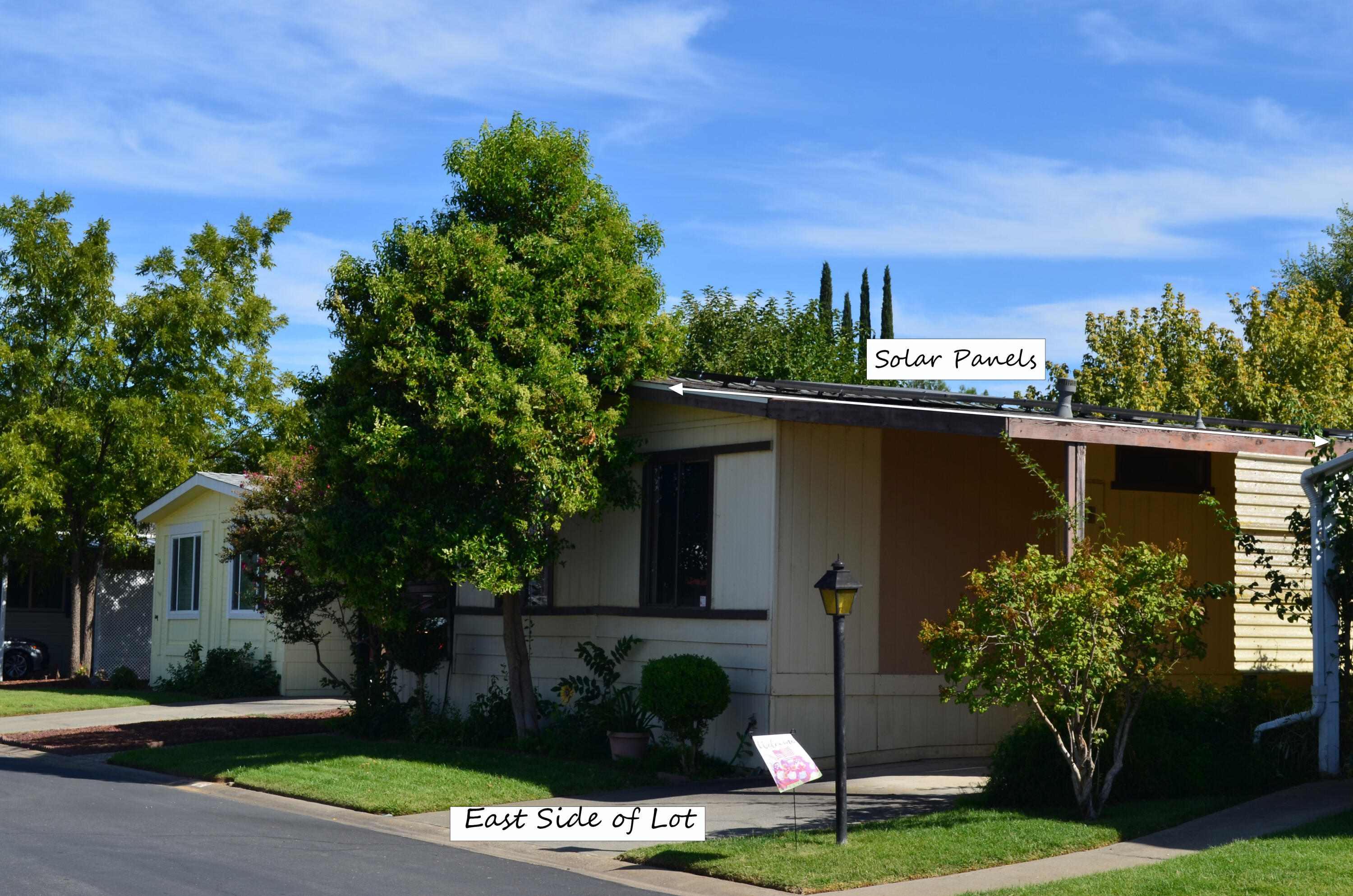 3835 Gardiner Ferry Road, Unit 17 Corning, CA 96021 - Photo 2 of 39 a front view of a house with garden