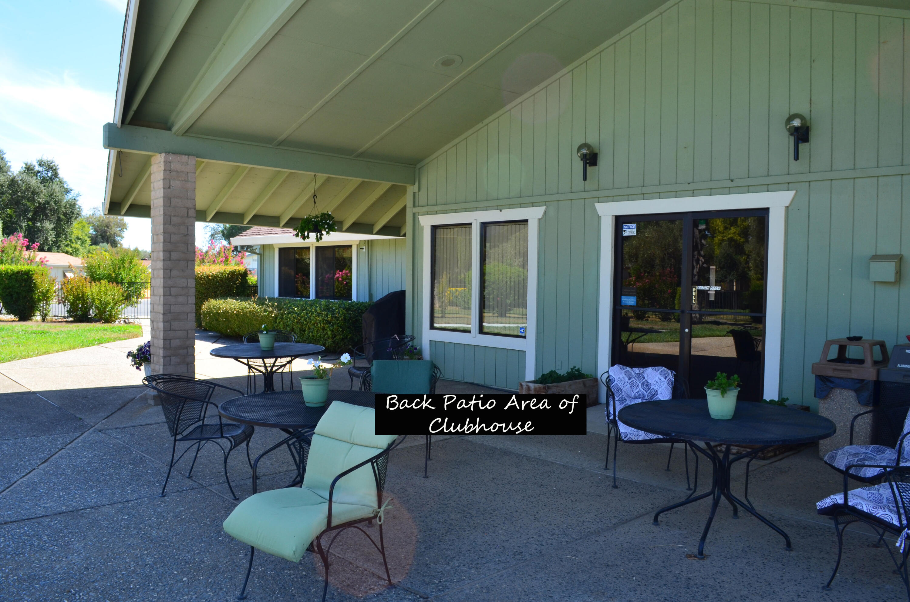 3835 Gardiner Ferry Road, Unit 17 Corning, CA 96021 - Photo 35 of 39 a building outdoor space with patio furniture and potted plants